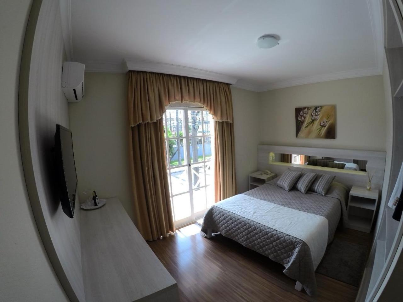 Quarto Duplo Deluxe com Varanda